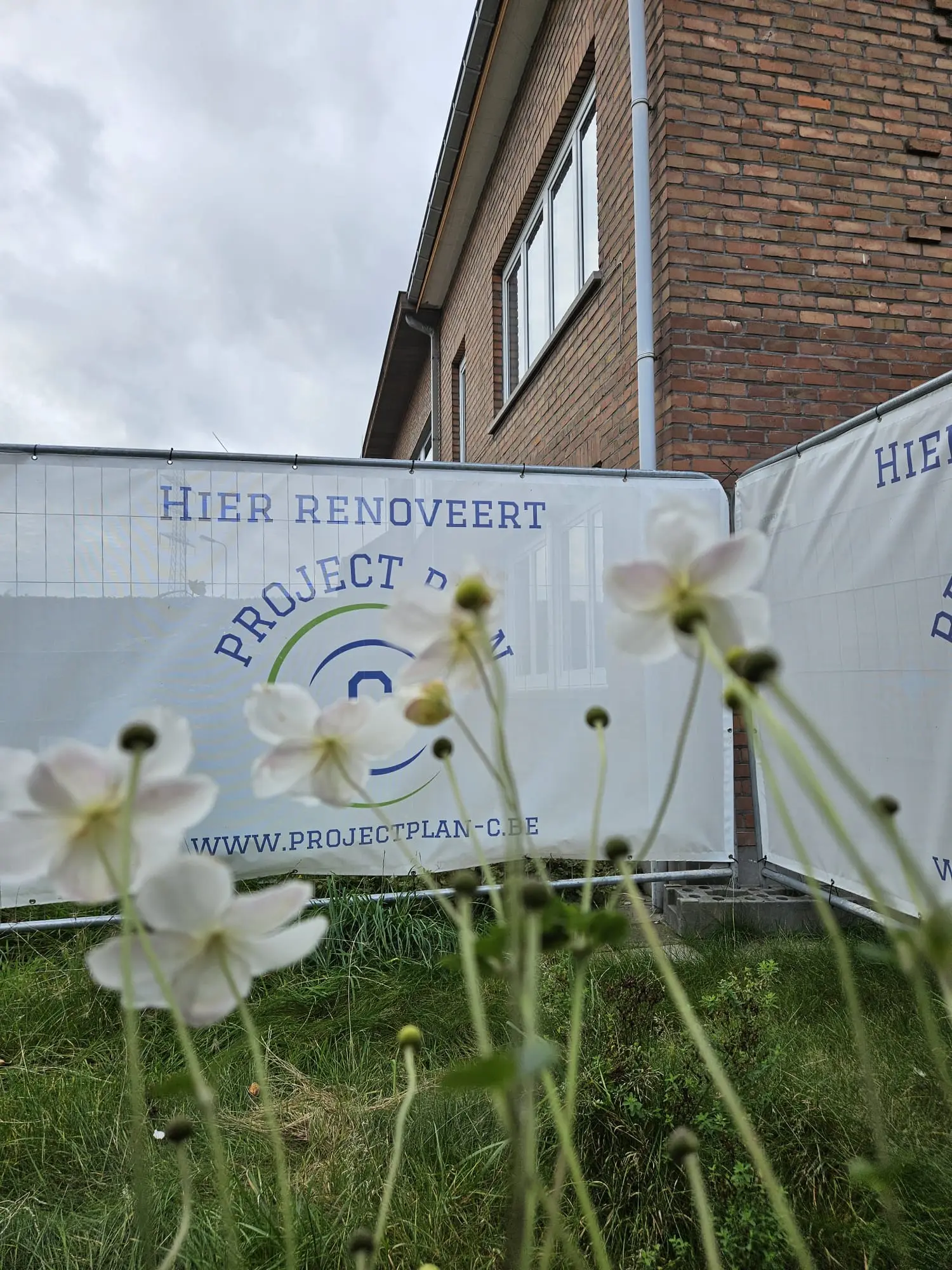 Renovatie appartementsgebouw tot drie appartementen in Wondelgem